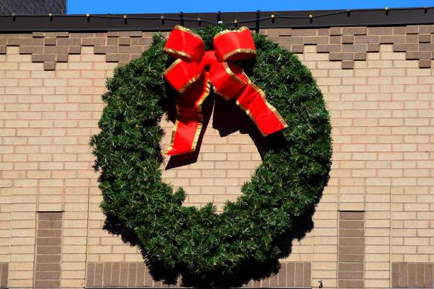 istock Large Christmas Wreath at Building exterior 2189428468