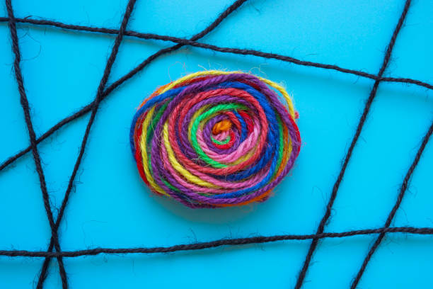 Bundle of colorful threads. Concept of unity, allyship, and resilience.