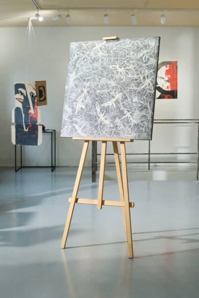 istock Easel with new art masterpiece in hall 2189437615