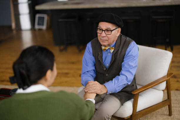 istock Senior Man Engaged in a Meaningful Conversation With a Younger Individual 2189440035