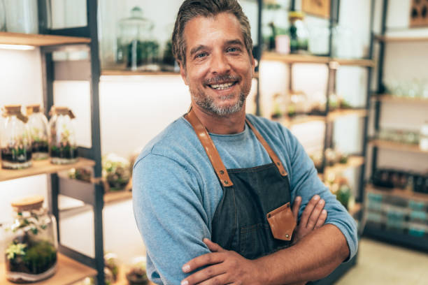 istock Cheerful flower shop owner 2189443331