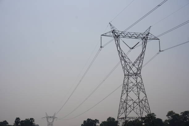 istock High-voltage electric wires are going through high-voltage transmission towards entire locality 2189443368