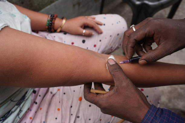 istock Pathologist is collecting blood from the vein 2189444630