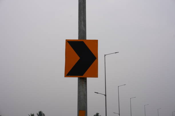 Right turn indicator sign on the roadside