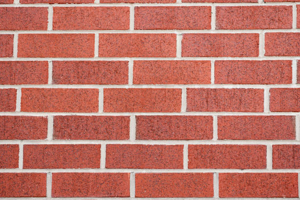 istock Building material concept. Surface of brickwall. Textured brown backdrop. Wall texture background. Brick wall structure. Brick masonry background. Masonry construction 2189450292