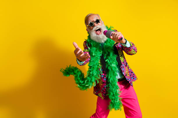 Portrait of charismatic singer hold microphone wear pit pants classy blazer empty space isolated on yellow color background.