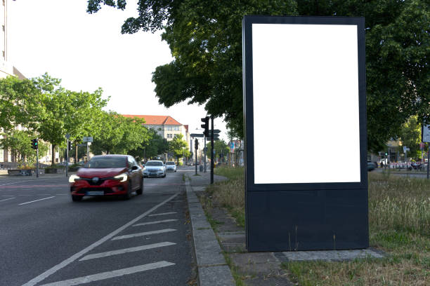 istock Empty white billboard portrait format on the street. 2189457336