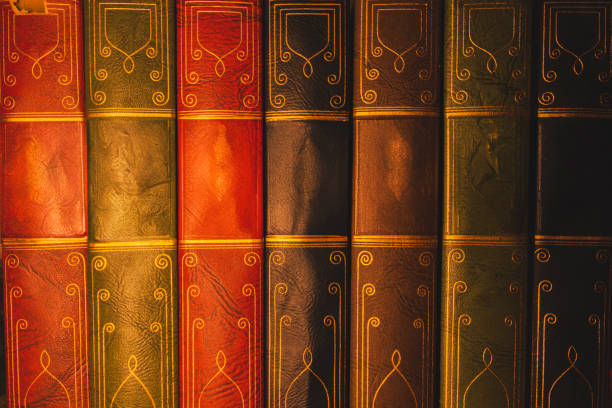Collection of MultiColoured Vintage Leather Bound Books.