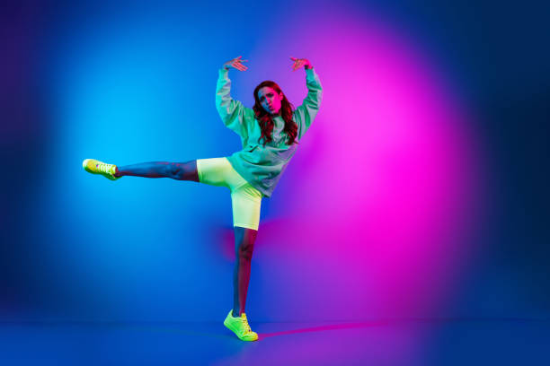 istock Full length photo of cheerful cool lady dressed having disco fun empty space isolated neon pink color background 2189462189
