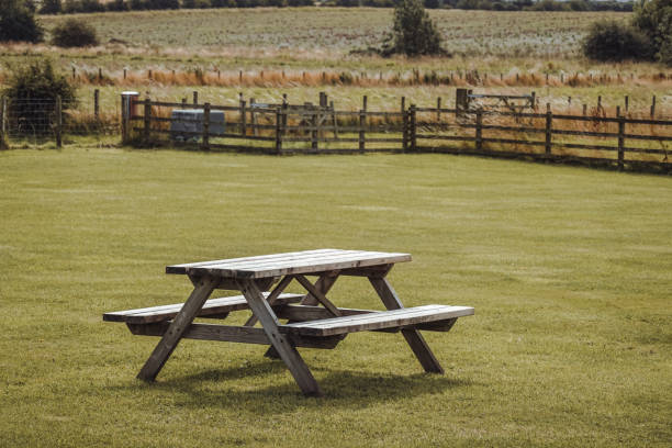istock Peaceful british landscape with a bench, picnic area 2189463872