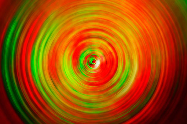 Patterns of red crosses in rectangular frames with a bright light in the center.