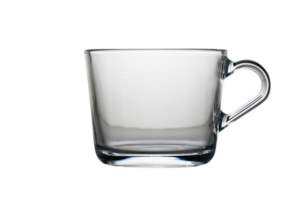 istock Minimalist glass cup rests elegantly on a plain background showcasing its transparent beauty 2189466413