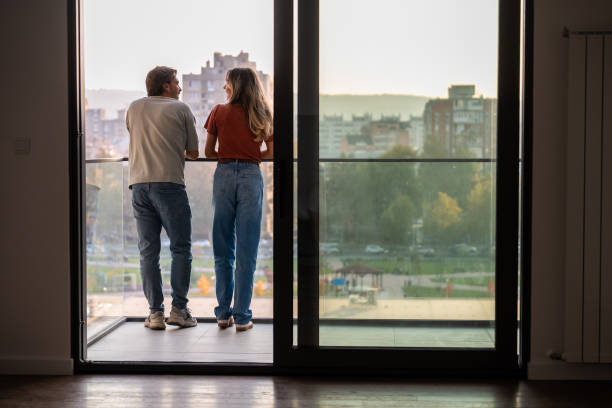istock Rear view of couple on the balcony 2189471415