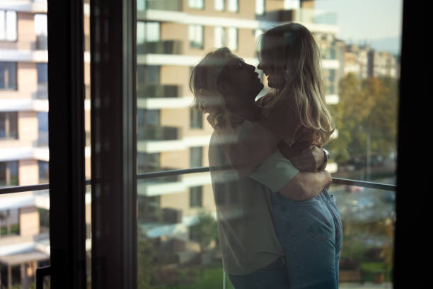 istock Couple Sharing a Kiss with a View 2189471503