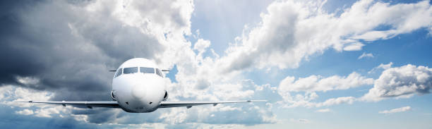 istock Commercial airplane flying in the sky with cloudscapes background 2189472214