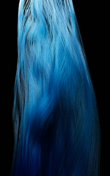 Conceptual studio shot of a modern creative woman with colorful flying braided dreads