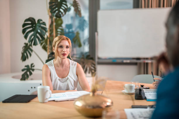 istock Caucasian Female Employee Discussing Ideas With Human Resources Team 2189474824