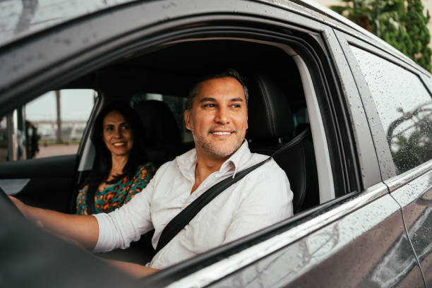 istock Couple arriving at hotel on vacation 2189476916