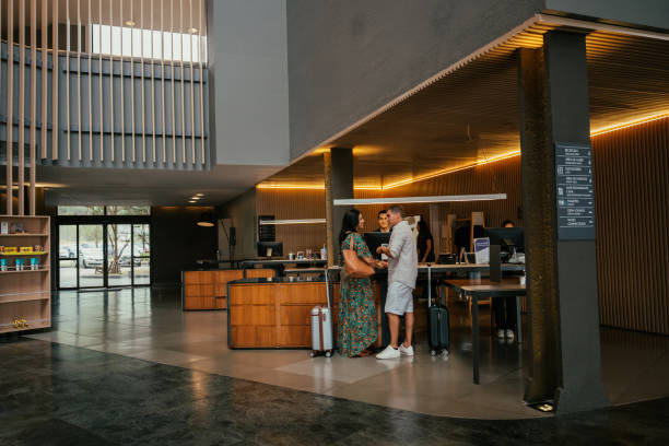 istock Couple checking in at hotel 2189476995