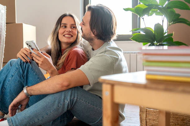 istock Couple Sharing a Moment on Their Phone 2189484962