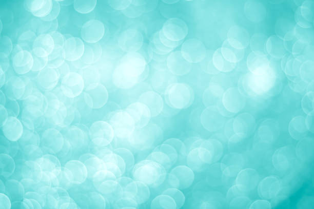 istock Glitter blue bokeh sparkle colorful bright white background 2189491391