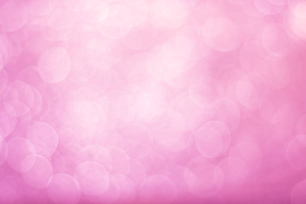 istock Glitter sparkle soft light bokeh pink silver white abstract background 2189492541