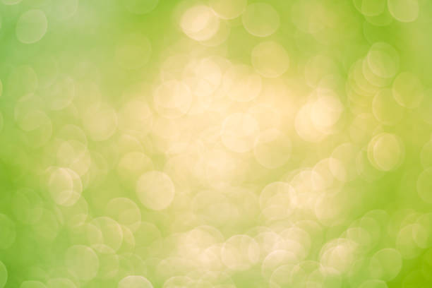 istock Soft sparkle glitter background with bright bokeh white and green 2189492560