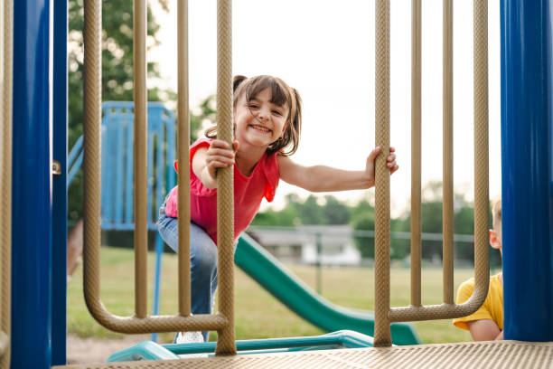 istock Girl playing at the park in Summer 2189497677