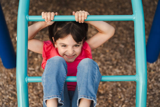 istock Girl playing at the park in Summer 2189497679