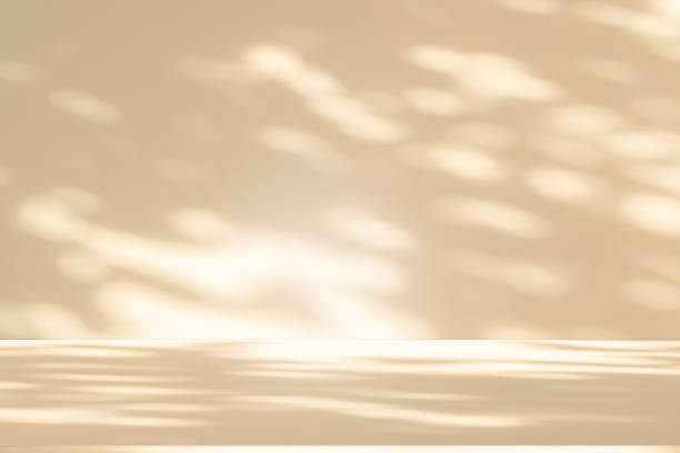 istock Studio style background wall decoration presentation uses white and beige tones. with shadows cast from a nearby window, concept creating a decorative 2189504654