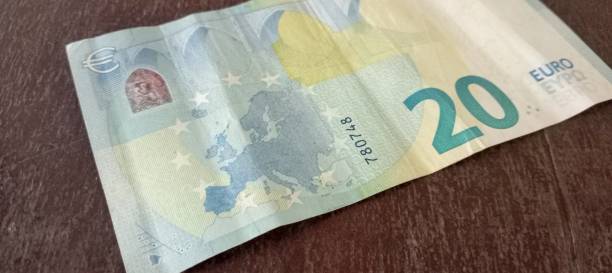 istock Twenty euro bank note on the garden 2189506313