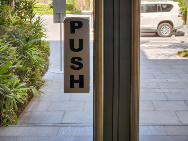 istock PUSH STICKER DISPLAYED ON A DOOR AT BUILDING EXIT ENTRANCE 2189510237