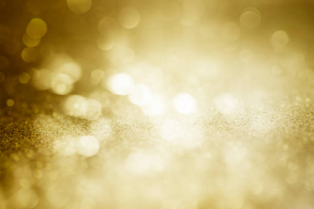 golden yellow bokeh glittering shining background