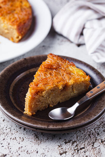 istock Traditional kugel - casserole from caramelized sweet noodles. 2189511191