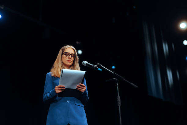 istock Woman Holding a Clipboard Ready to Deliver a Speech 2189512641