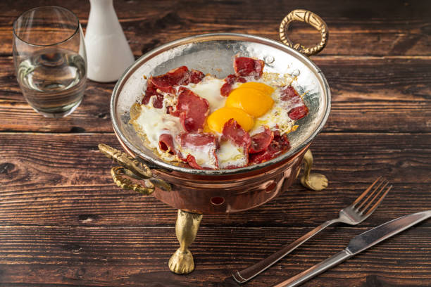 istock Traditional Turkish breakfast eggs with fried pastrami or bacon. Turkish name Pastirmali yumurta 2189516278