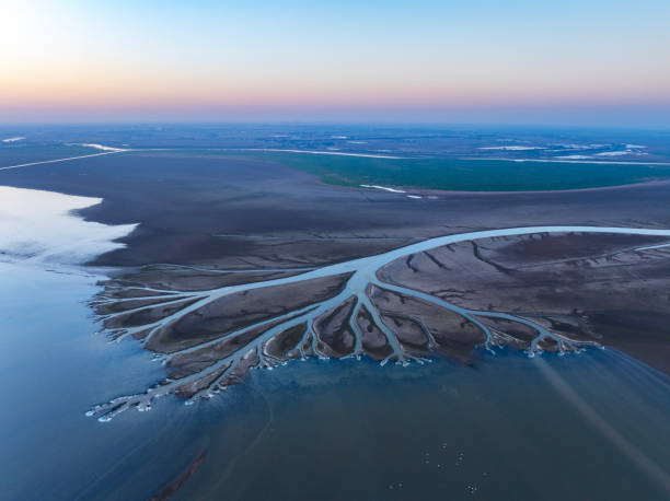istock Sunset, wetland park lake landscape overlooking 2189519889