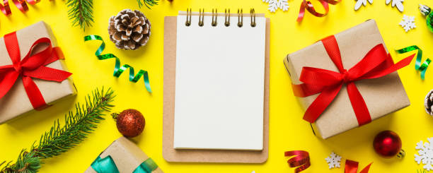 istock Christmas blank greeting card mock-up scene. Creative layout made of Christmas tree branches and paper card note. Flat lay. Nature New Year concept 2189521140