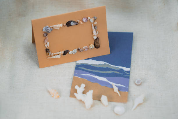 istock Handmade Gift Card with Seashell Frame, Ocean-Inspired Festive Greeting Design with copy space for text 2189521410