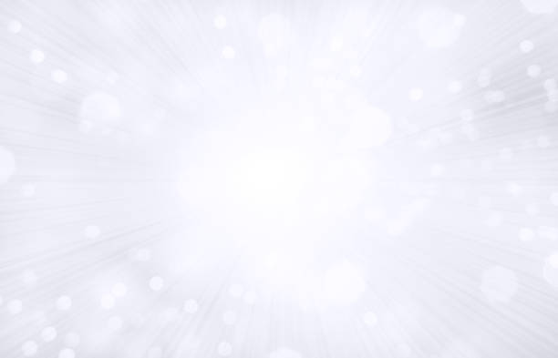 istock A creative glittery grey white colored festive Christmas New Year, Diwali blank vector backgrounds with a bright silver sunburst pattern and shining sun beam in the centre and circular disc or ring shape bright light with rays 2189532979