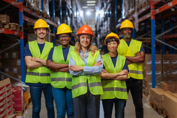 istock Diverse warehouse team in safety gear 2189535957