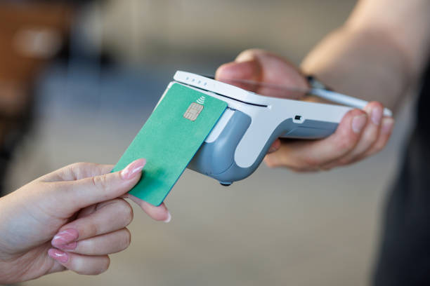 istock Contactless Payment with Green Credit Card 2189538474