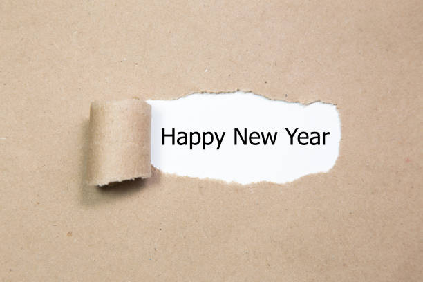istock Happy New Year on Torn Paper 2189542443