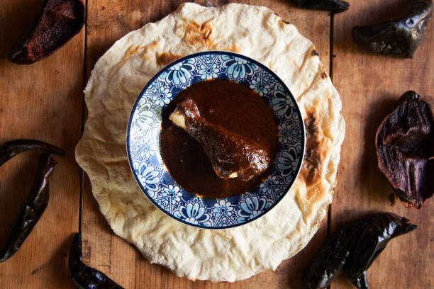 istock Authentic Mexican Mole Negro prepared with local ingredients from Oaxaca served with chicken. Original Mexican recipe. 2189545305