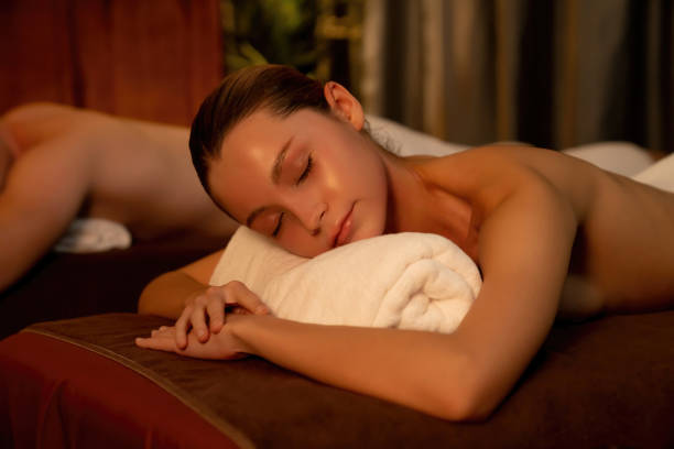 istock Caucasian couple customer enjoying relaxing anti-stress massage. Quiescent 2189547310