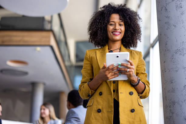 istock Confident Businesswoman Using a Tablet in a Modern Office Environment 2189550220