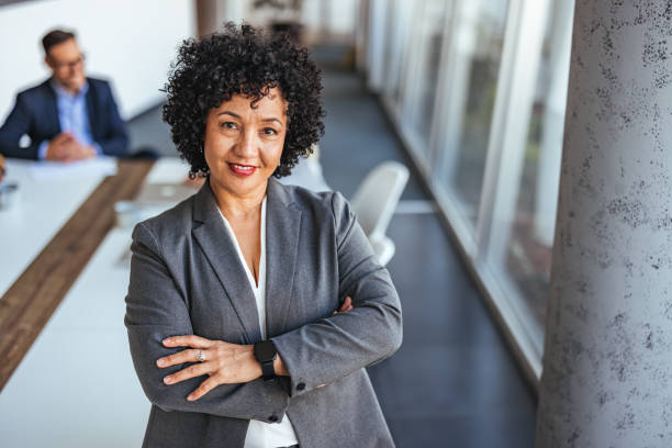 istock Confident Businesswoman Standing in Modern Office Environment 2189550929