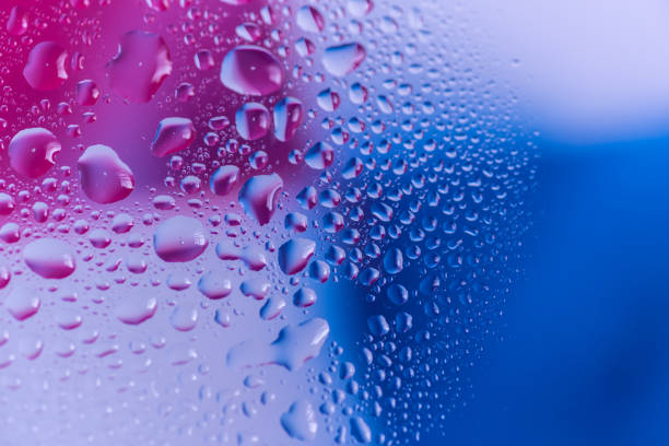istock Blue and red water droplets on glass 2189551186