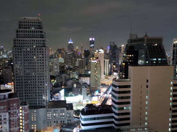 Bangkok cityscape at night from rooftop in Sukhumvit. Thailand