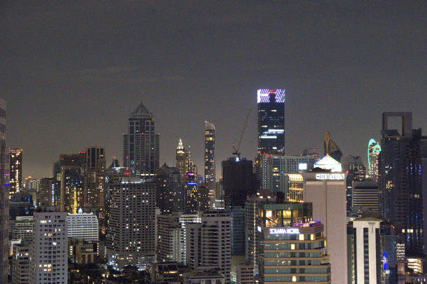Bangkok skyline at night from rooftop in Sukhumvit. Thailand